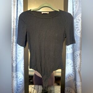 Elodie Black Bodysuit. Quarter length sleeve. Size Small.
